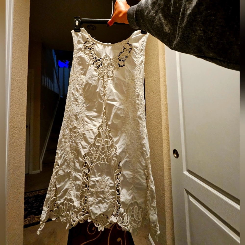 Lace white dress with cutouts